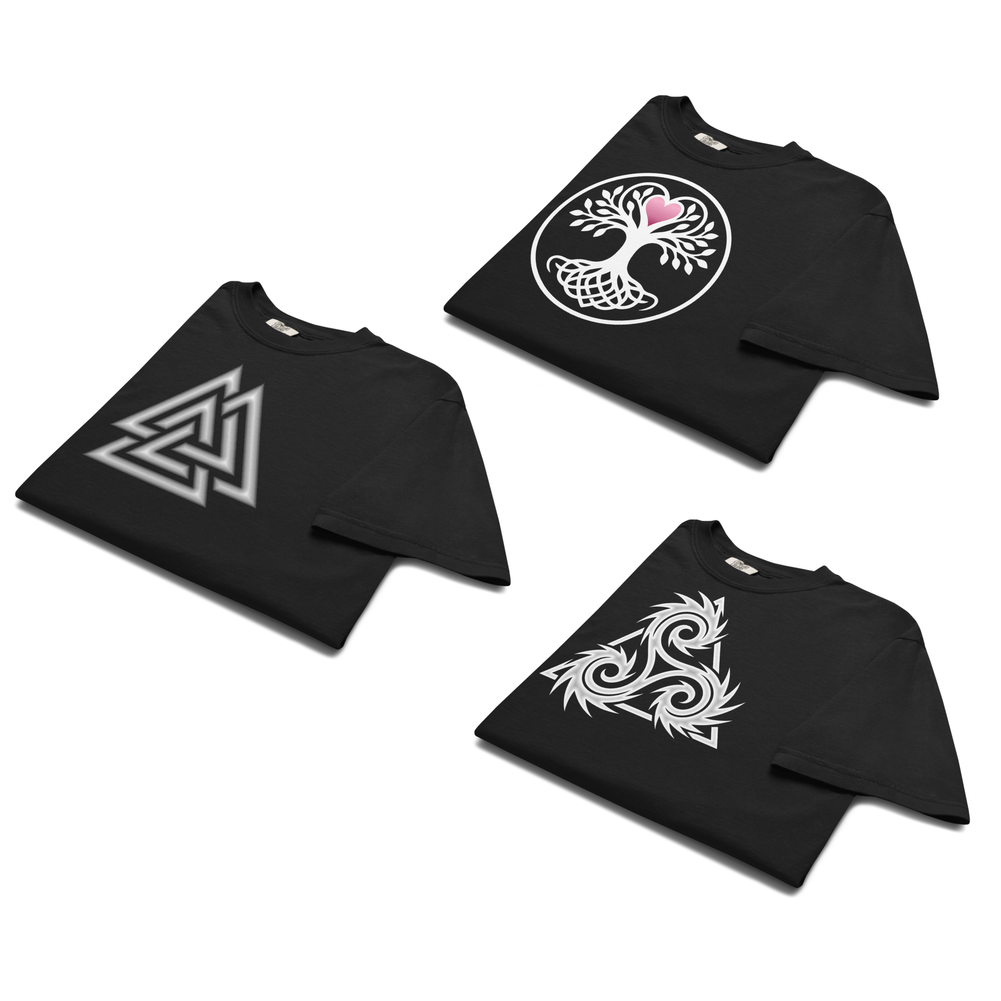 Three folded black t-shirts displaying Norse symbols: a white and silver Valknut, a white Yggdrasil tree of life with a pink heart, and a white dramatic triskelion graphic.