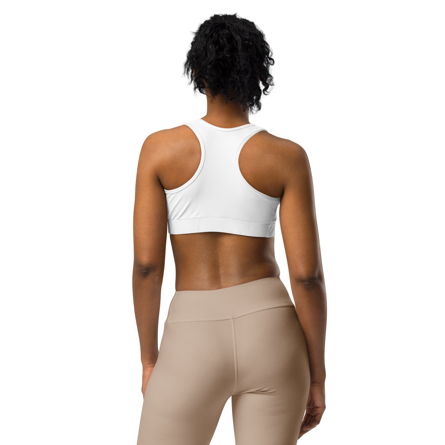 Back view of a woman wearing a plain white racerback sports bra, shown against a transparent background; sports bra apparel.