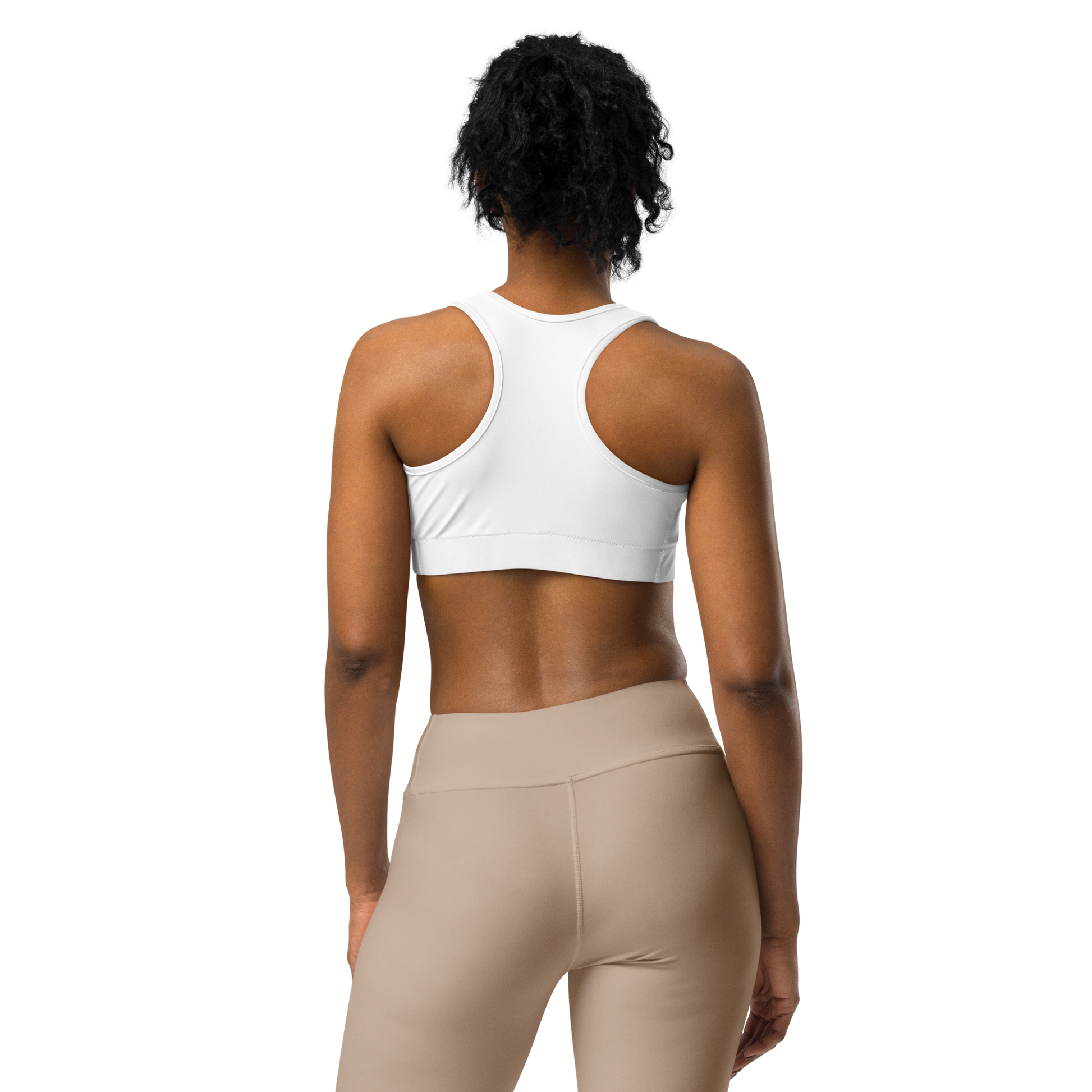 Back view of a woman wearing a plain white racerback sports bra, shown against a transparent background; sports bra apparel.