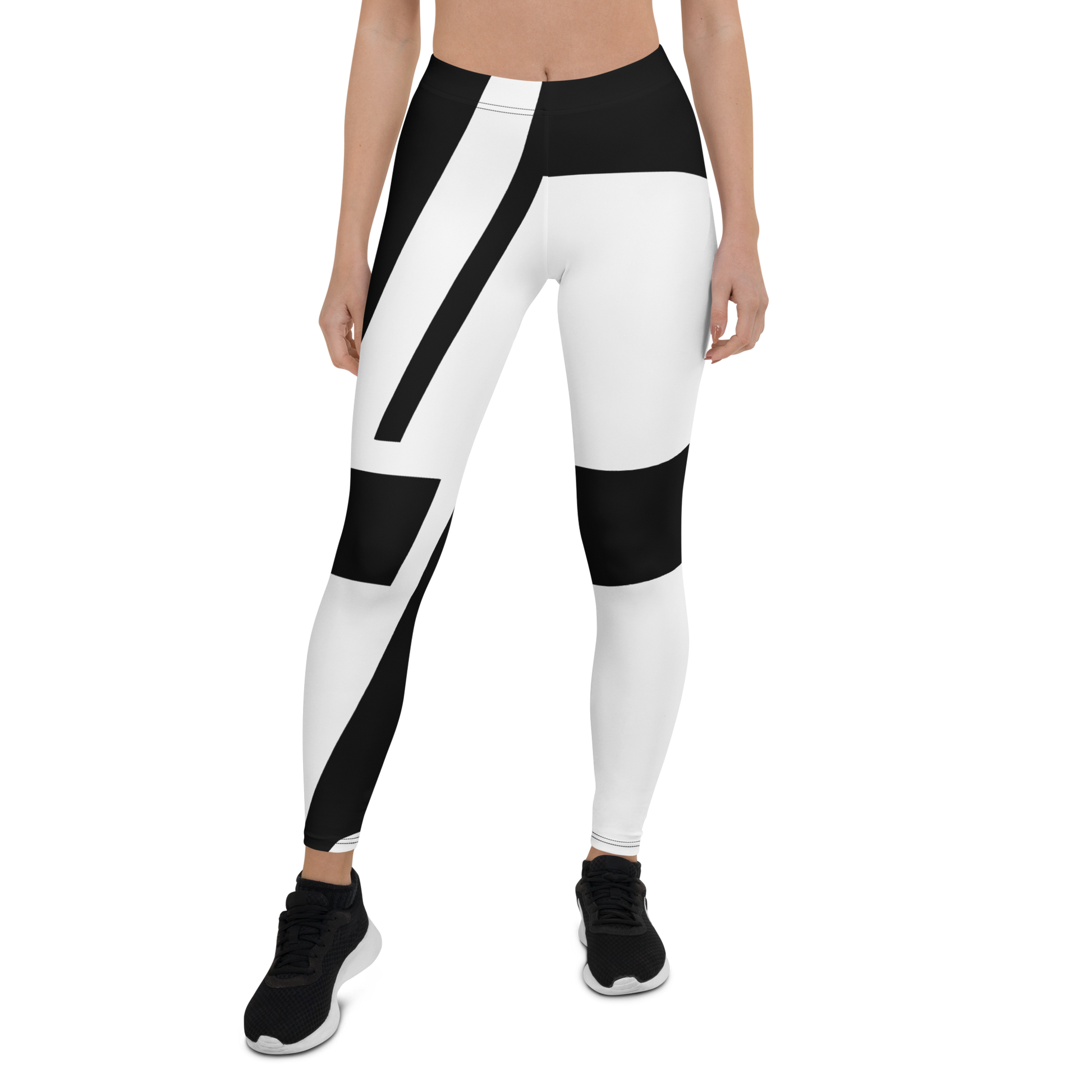 High-waisted leggings with bold black and white wraparound LP logo print, worn by a model with black sneakers, apparel.