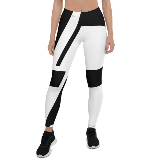 High-waisted leggings with bold black and white wraparound LP logo print, worn by a model with black sneakers, apparel.