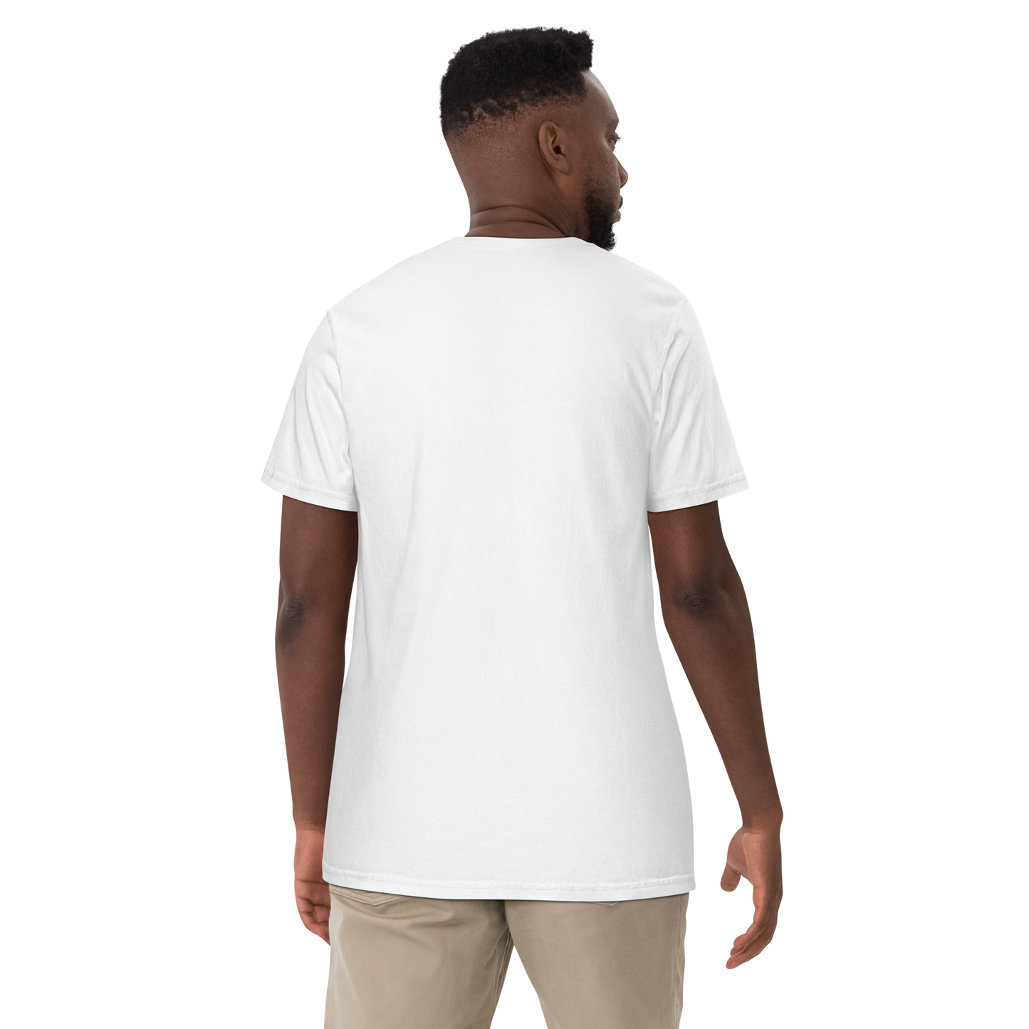 Back view of a man wearing a plain white short-sleeve t-shirt with no back graphic, paired with khaki pants, shown against a transparent background.