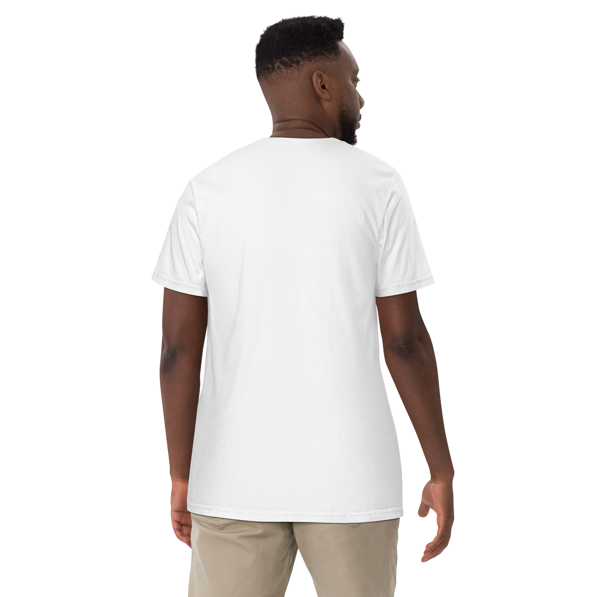 Back view of a man wearing a plain white short-sleeve t-shirt with no back graphic, paired with khaki pants, shown against a transparent background.