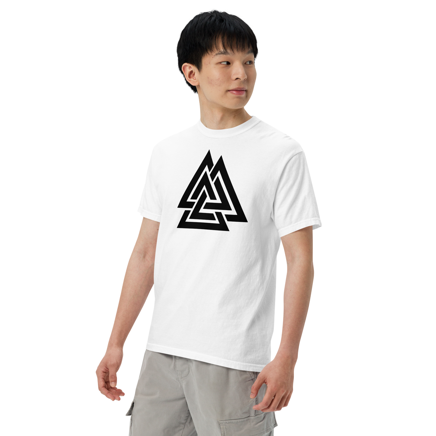 White unisex t-shirt featuring a bold black Valknut symbol — three interlocked triangles — centered on the chest, modeled by a young man against a transparent background. Apparel.